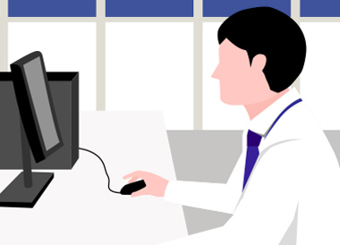 パソコンで数値を分析する男性スタッフ